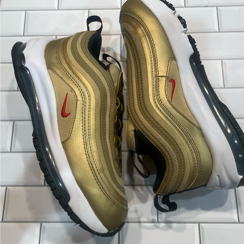 Nike Air Max Gold with Red Accents